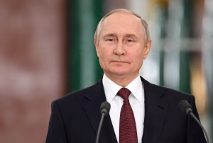PUTIN PROMISES RETALIATION OVER LUHANSK